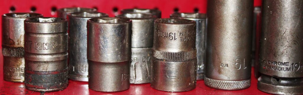 A collection of well-worn wrench sockets. 

Make sure to include your bike's sockets in its own specific toolkit.