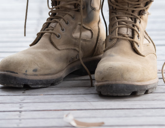 An old worn pair of lace-up boots